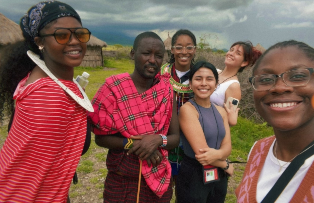 Study abroad student Ines Donfack Kenfack posing with a group of friends while studying abroad in Tanzania.