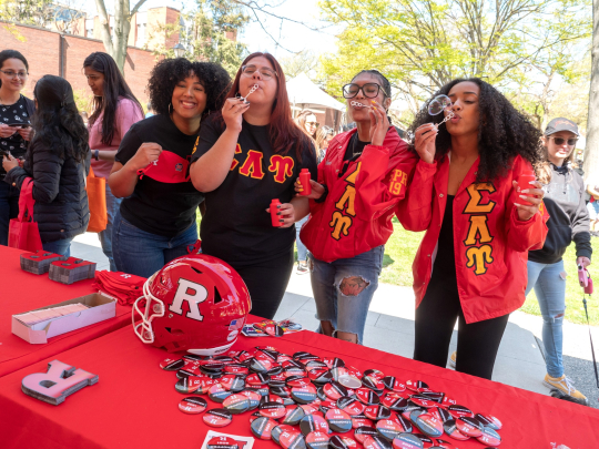 Sorority members have fun with bubbles on the College Avenue campus on Rutgers Day