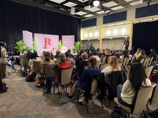 A room of people seating during a Bridging Minds event