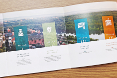 Rutgers–New Brunswick's Academic Master Plan booklet open on a table